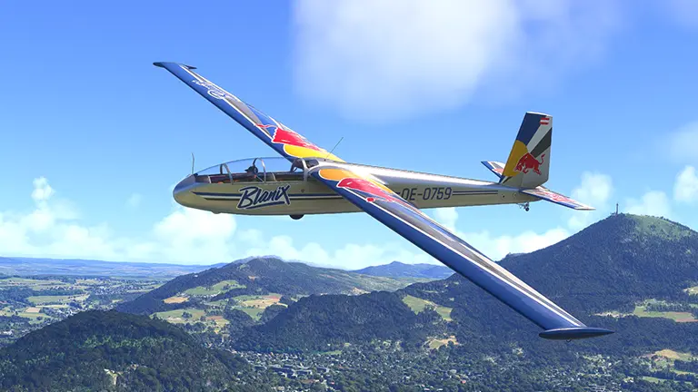 L-13 Blaník glider by TouchingCloud flying over the mountains